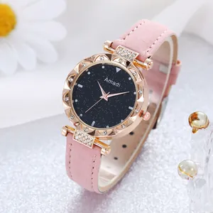 Reloj de cuarzo para mujer en oro rosa con esfera de cielo estrellado y correa rosa