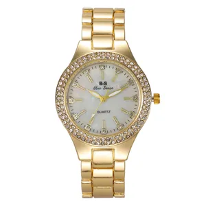 Elegante orologio al quarzo dorato da donna con strass e quadrante in madreperla