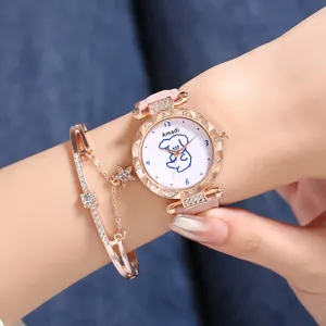 Close-up of rose gold quartz watch with cartoon dog dial and matching star bracelet
