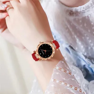 Elegant women's quartz watch with red leather strap and sparkling starry sky dial