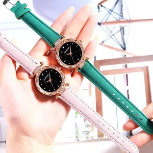 Fashionable women's starry sky quartz watches with rhinestone bezel and leather straps