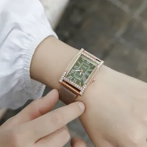 Elegant rose gold rectangular watch with green dial and roman numerals for women