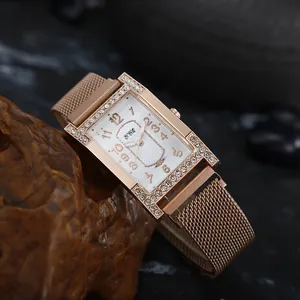Women's rose gold rectangular quartz watch with rhinestone bezel and Milanese mesh strap