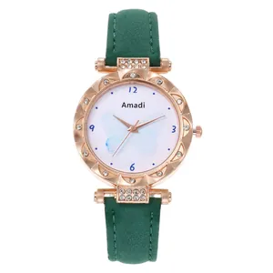 Montre quartz femme or rose avec cadran papillon et bracelet en cuir vert