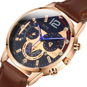 Macro shot of business watch with rose gold case, blue dial, and brown leather strap