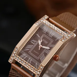 Detail shot of rectangular women's watch with rhinestone bezel and brown roman dial