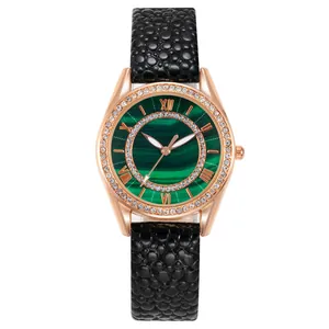 Women's rose gold watch with a green marble dial, crystal bezel and black leather strap
