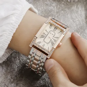Elegant rectangular rose gold women's watch with rhinestone bezel and metal link bracelet