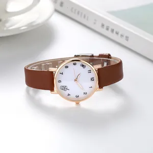 Montre minimaliste pour femme avec bracelet en cuir marron et cadran à motif mignon