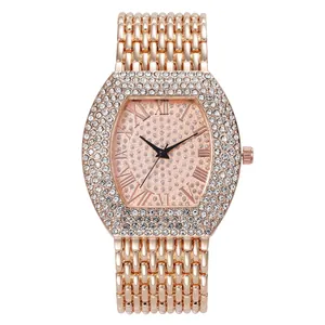 Luxurious rose gold tonneau watch for women with rhinestone bezel and roman numerals