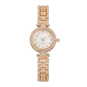 Elegant rose gold quartz watch for women featuring a crystal bezel and beaded chain strap