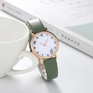 Vue détaillée de la montre à quartz en cuir vert avec illustrations sur le cadran
