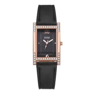Detail of square rose gold watch with rhinestone bezel and black leather strap textures
