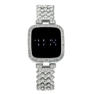 Women's silver LED watch featuring luxury crystal paved case and X-link bracelet
