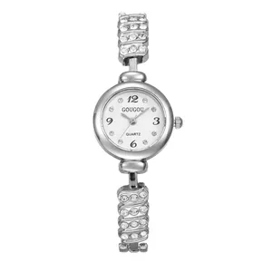 Elegant silver women's quartz watch with rhinestone-studded chain strap and round dial
