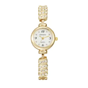 Elegant gold quartz watch for women with rhinestone-studded band and white round dial
