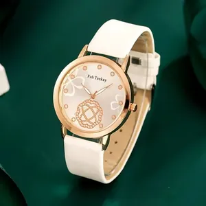 Detailed macro view of white leather strap watch with floral champagne dial and rose gold case