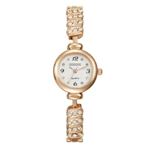 Rose gold quartz watch for women with slim diamond-encrusted strap and white round dial