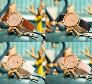 Makro-Anzeige von Damen-Roségold-Blumenuhren mit bunten Lederarmbändern in vier Farben