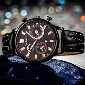 Macro shot of business watch face with calendar display and leather strap details
