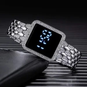 Close-up of square LED watch with rhinestone bezel and silver honeycomb metal strap