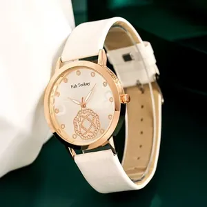Chic women's watch with white leather strap and floral hollow dial in rose gold