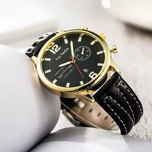 Business men's quartz watch with gold case, black leather strap and calendar display