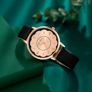 Montre à quartz élégante pour femme avec bracelet en cuir noir et cadran texturé rose doré
