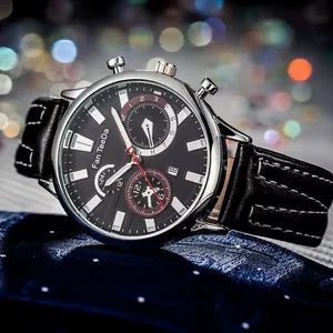 Business men's watch with black dial, silver markers, and leather strap in bokeh lighting