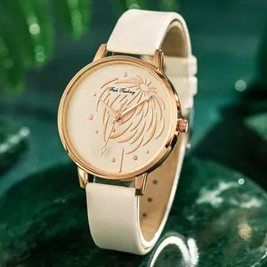 Montre à quartz élégante pour femme avec boîtier or rose et bracelet en cuir blanc