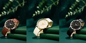 Drei elegante Damen-Quarzuhren mit Lederarmband und glänzenden Strass-Stundenmarkierungen