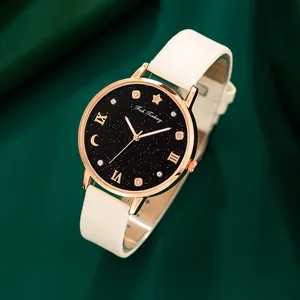 Reloj de mujer con esfera de estrella y luna, caja de oro rosa y correa de cuero crema