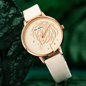 Montre minimaliste pour femme en or rose avec motif floral et bracelet en cuir blanc