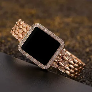 Macro shot of luxury rose gold square watch case with pave crystals and honeycomb strap