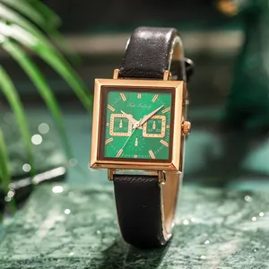 Fashionable square gold watch with emerald green dial and black textured leather strap