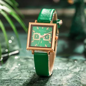 Elegant women's square quartz watch with emerald green dial and gold-tone leather strap