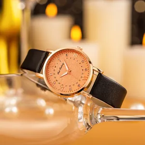 Orologio al quarzo da donna con cinturino in pelle nera e quadrante terra oro rosa