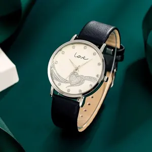 Montre à quartz pour femmes avec bracelet en cuir, cadran argenté et motif cœur diamanté