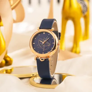 Orologio al quarzo da donna con quadrante blu su specchio dorato e sfondo in seta bianca
