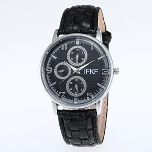 Macro shot of business watch with multi-function sub-dials and black leather strap