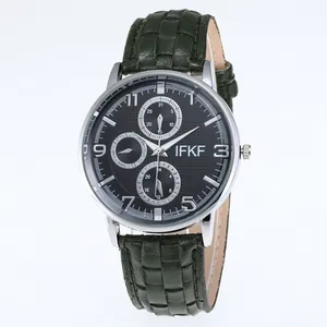 Detail of IFKF men's quartz watch showing three-eye dial and green woven leather strap