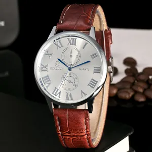 Orologio al quarzo con numeri romani, cinturino in pelle marrone e quadrante argento