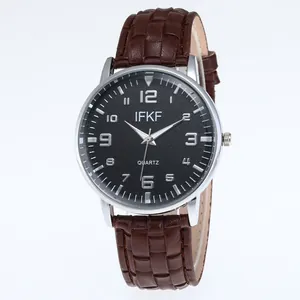 Men's fashion quartz watch with black dial, silver numerals and brown leather strap