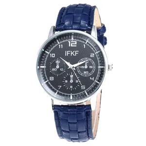 Detail of IFKF men's watch featuring a black grid dial and blue embossed leather strap