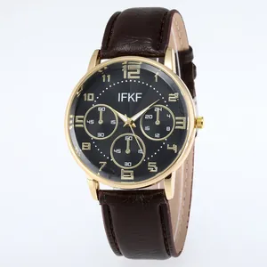 Macro view of men's quartz watch with gold alloy case and brown embossed leather strap