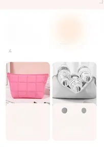 Detail of pink quilted makeup bag showing premium textured fabric and sturdy zipper closure