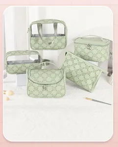 Detailed set of 5 light green floral waterproof makeup bags with different storage sizes