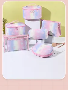 Detailed set of glitter gradient cosmetic bags with heart patterns and PVC windows