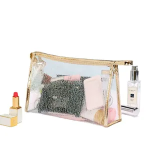 Trousse à maquillage transparente avec maille pailletée dorée et fermeture éclair