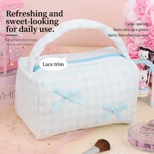 Large capacity light blue plaid makeup bag with bow accents and lace trim design